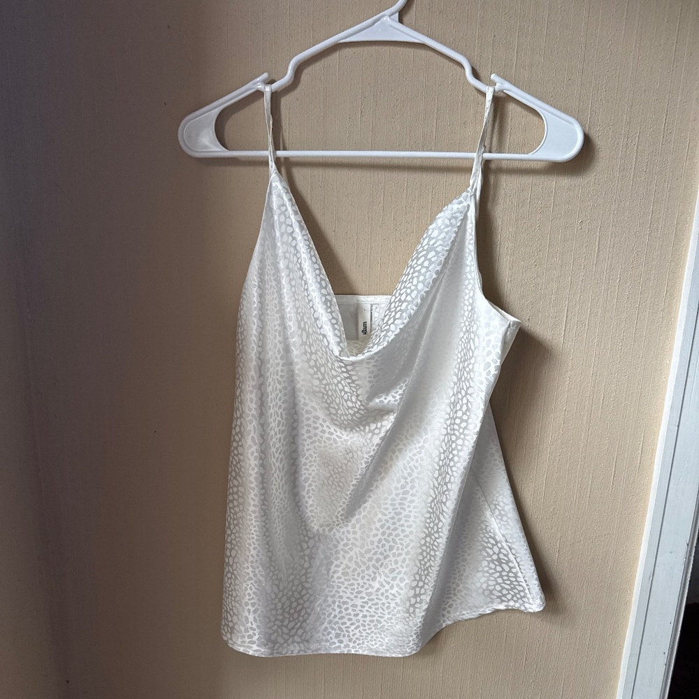 Strappy top , flowy , monochromatic animal print